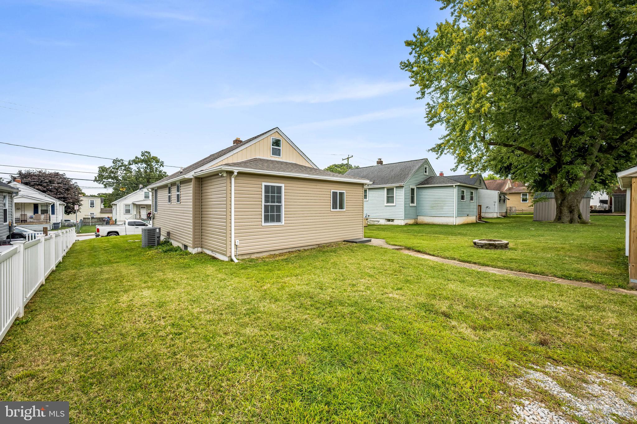 628 North Stuart Street Baltimore, MD 21221 - Photo 34 of 39 a view of a house with backyard and garden