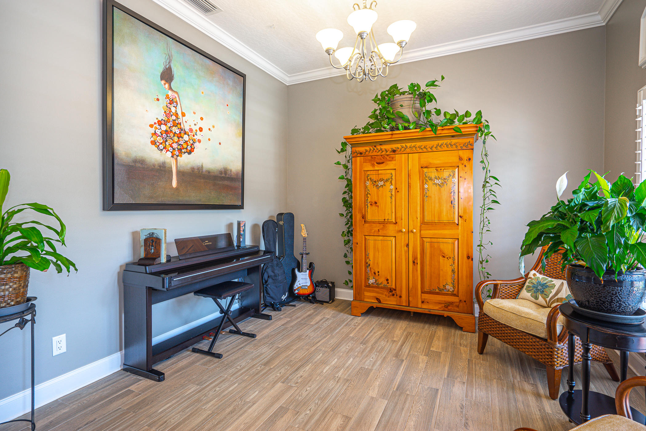 569 Radiant Circle Mary Esther, FL 32569 - Photo 12 of 42 a workspace room with furniture and wooden floor