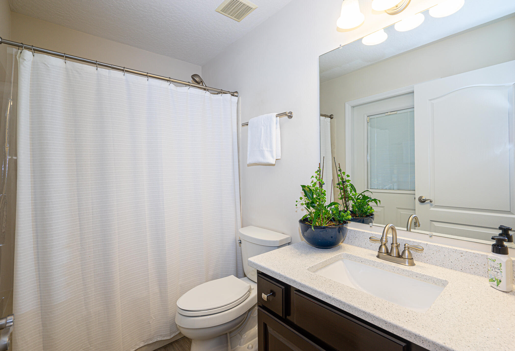 569 Radiant Circle Mary Esther, FL 32569 - Photo 16 of 42 a bathroom with a sink and a mirror