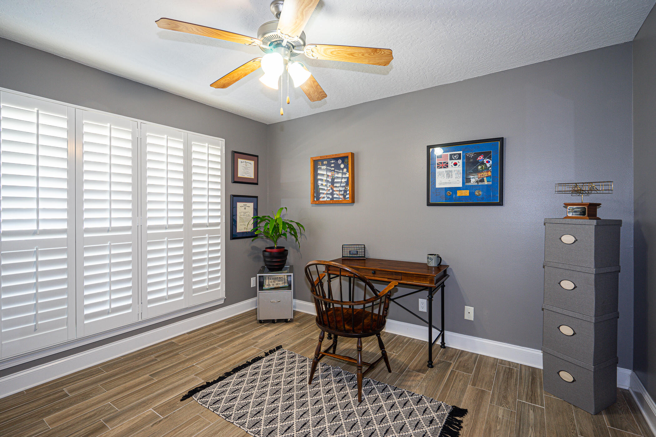 569 Radiant Circle Mary Esther, FL 32569 - Photo 30 of 42 a view of a workspace with furniture and a window