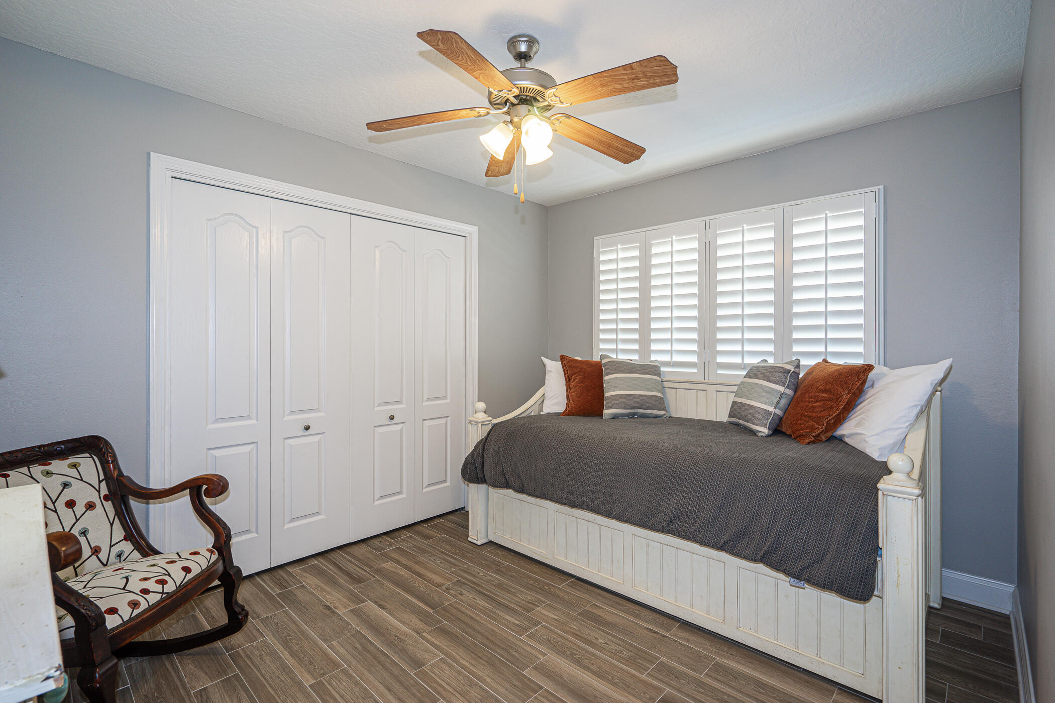 569 Radiant Circle Mary Esther, FL 32569 - Photo 32 of 42 a bedroom with a bed and window