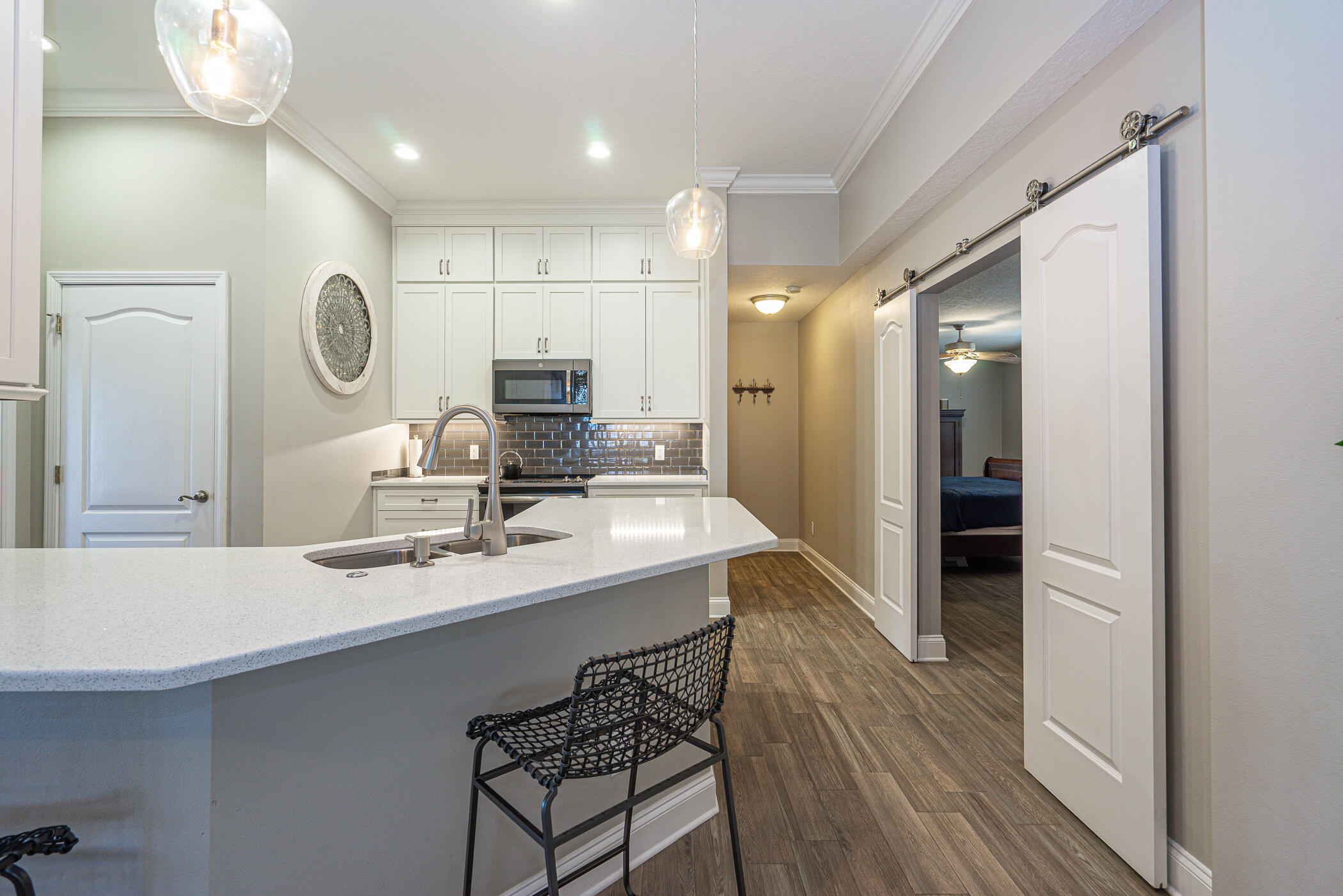 569 Radiant Circle Mary Esther, FL 32569 - Photo 33 of 42 a bathroom with a sink a mirror and a shower
