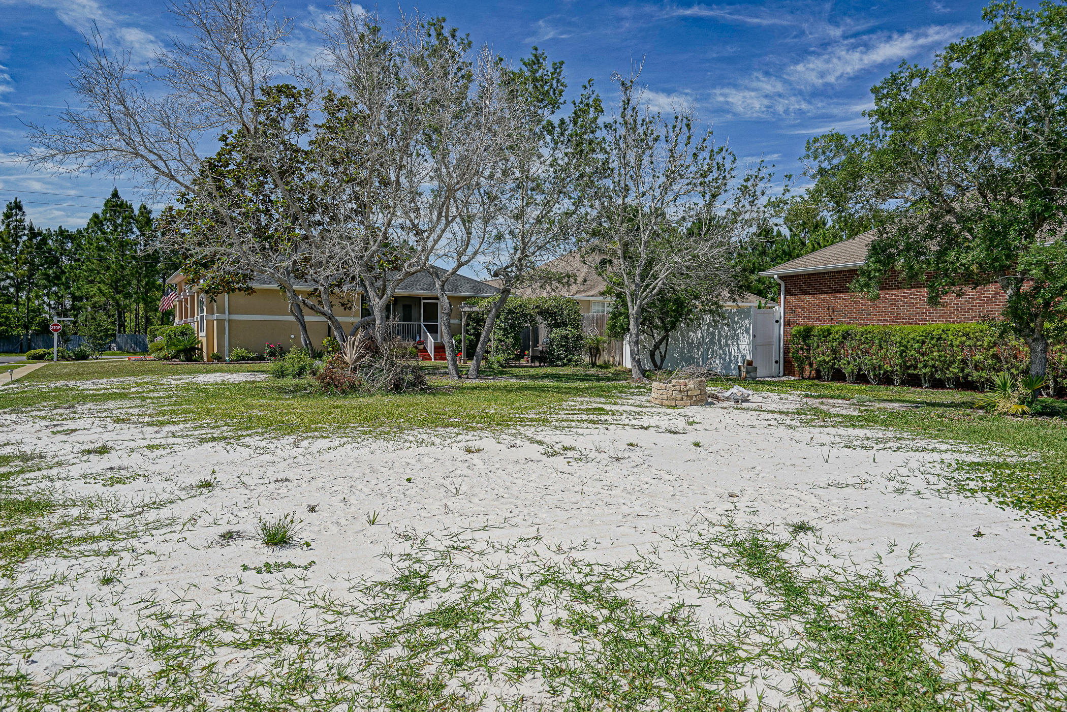 569 Radiant Circle Mary Esther, FL 32569 - Photo 34 of 42 a front view of a house with a yard