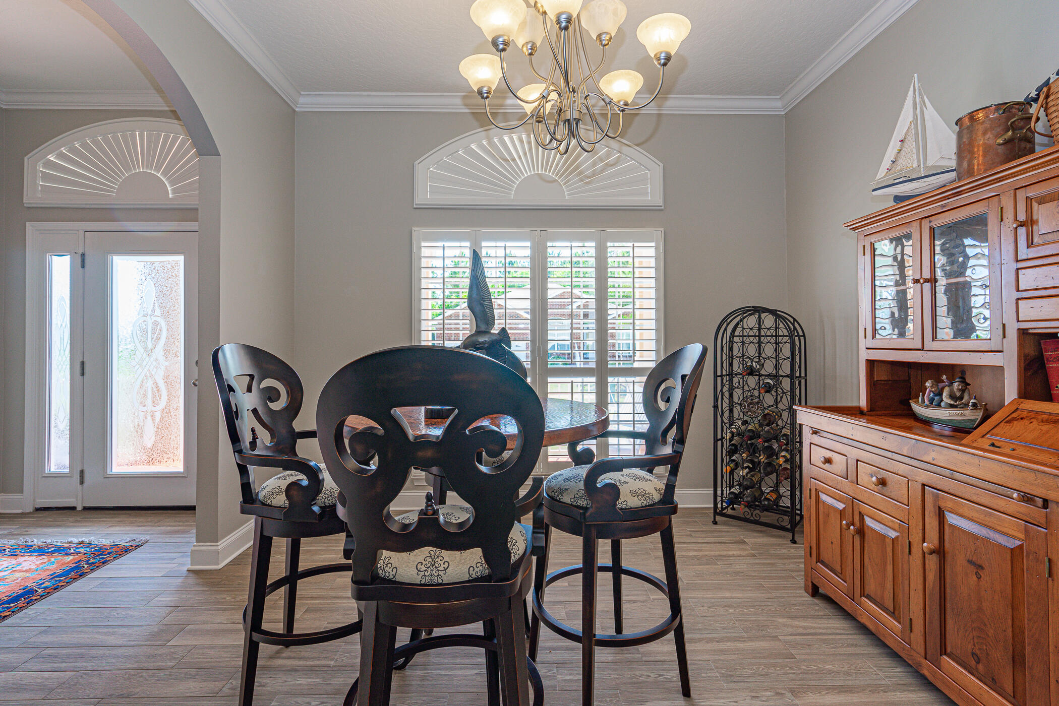 569 Radiant Circle Mary Esther, FL 32569 - Photo 37 of 42 a view of a dining room with furniture window and wooden floor