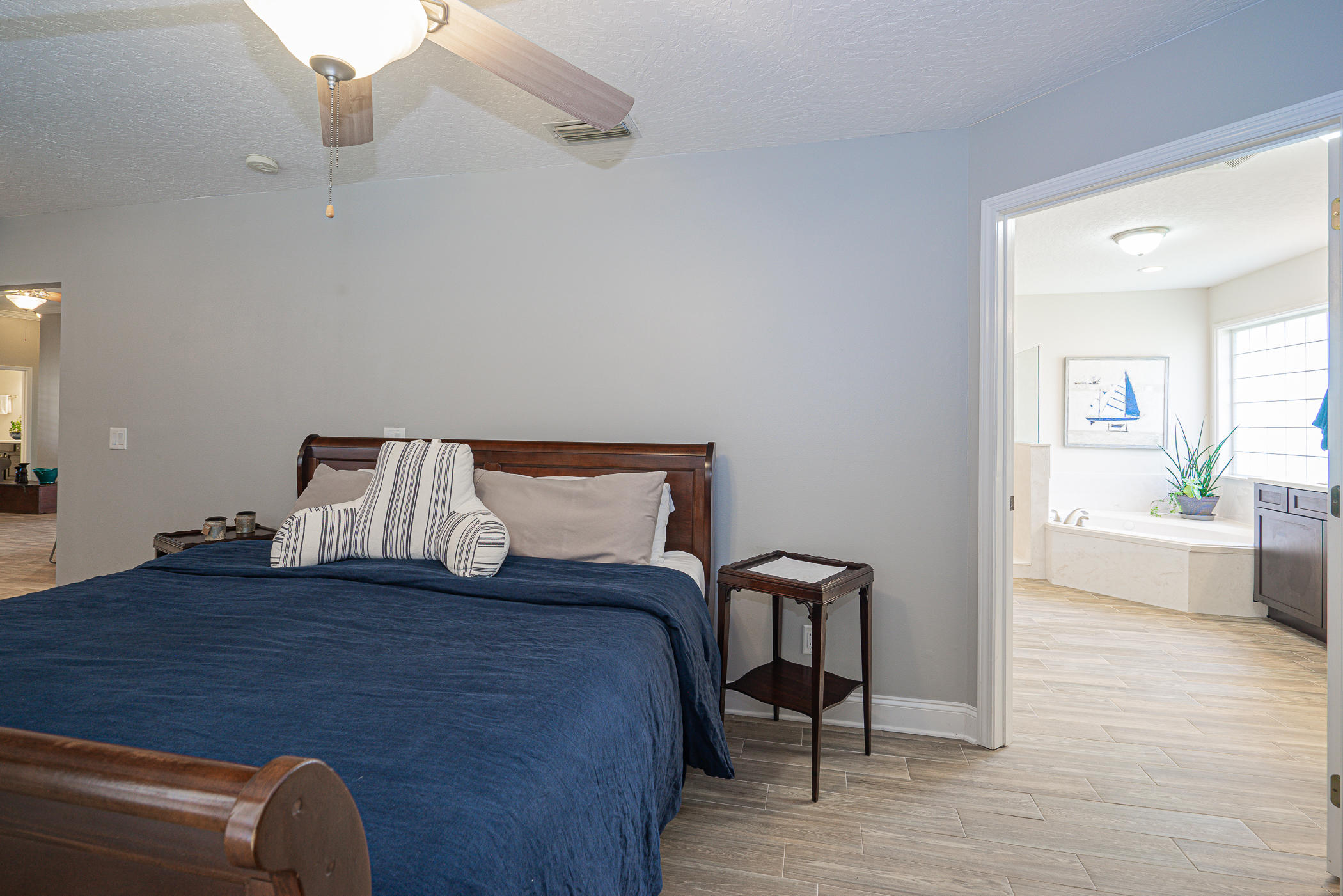 569 Radiant Circle Mary Esther, FL 32569 - Photo 40 of 42 a bed room with a bed and a chair