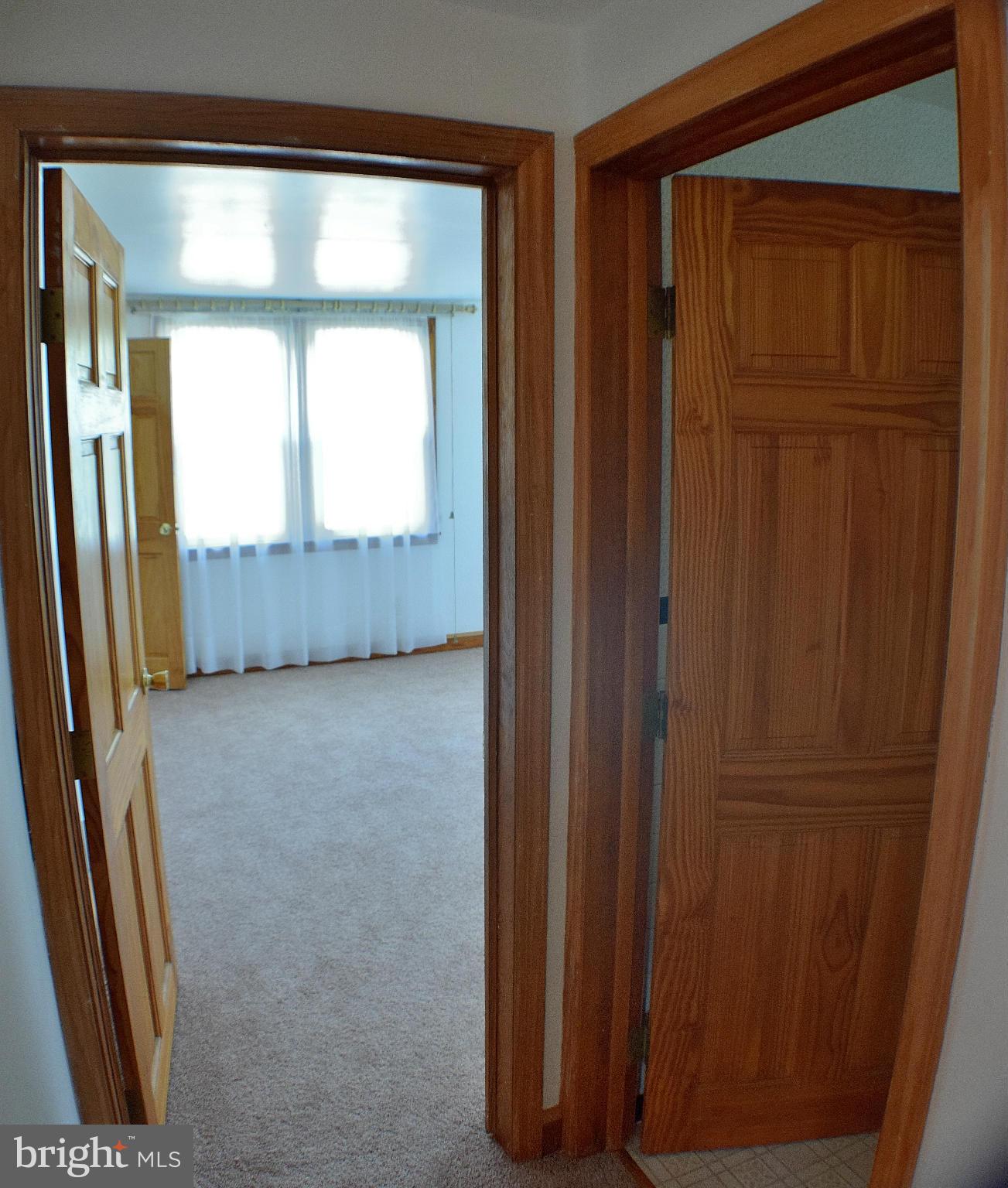 5727 Shookstown Road Frederick, MD 21702 - Photo 17 of 30 Main Floor Bedroom. Bathroom on Right