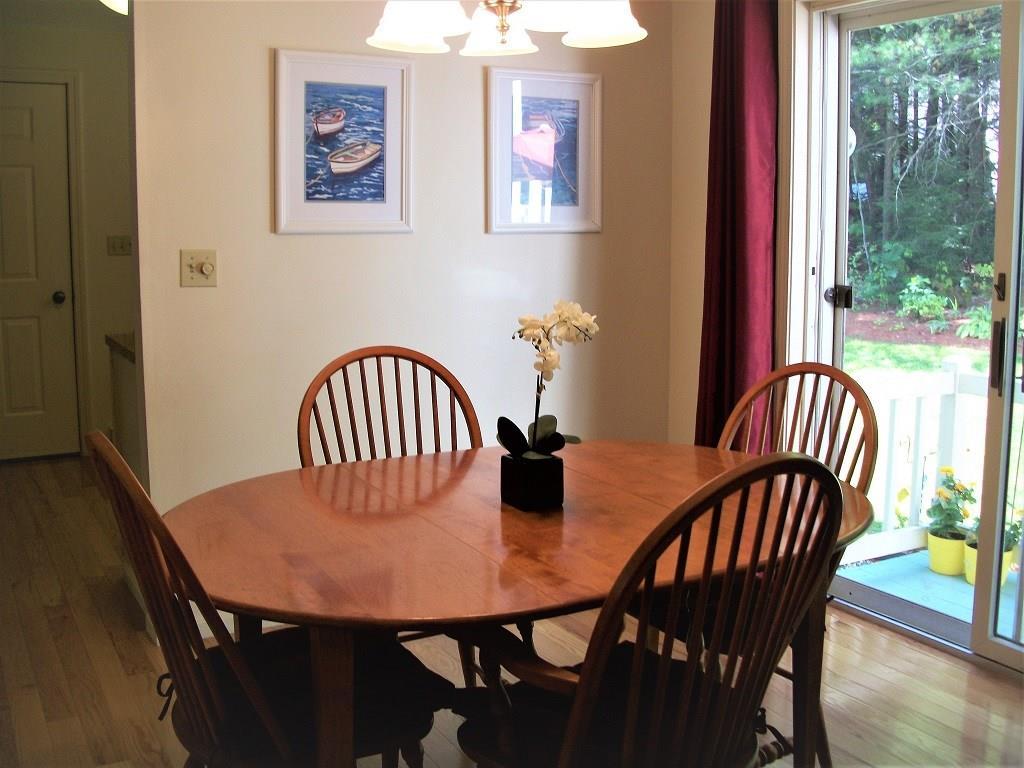 4 Azalea Lane, Unit 2 Windham, ME 04062 - Photo 12 of 33 Dining room looking out to kitchen...