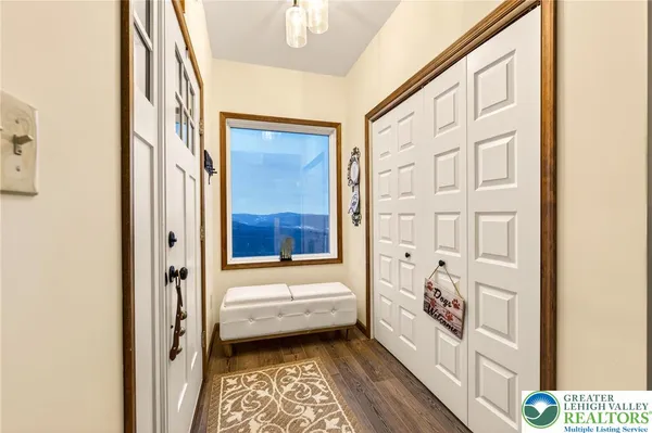 a bed room with a bed and a chair