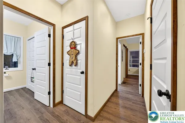 a bathroom with a sink a mirror and a shower