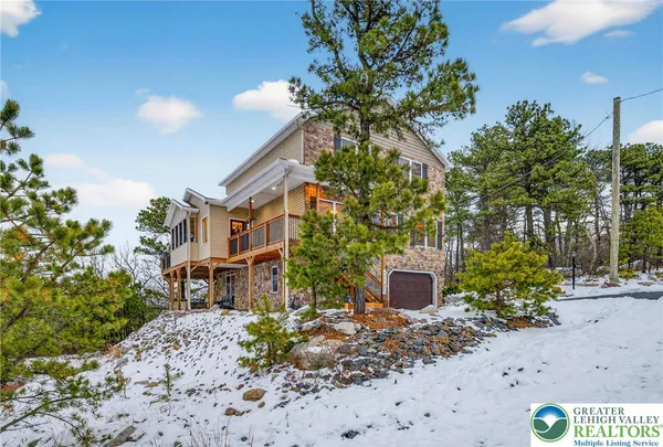 a view of balcony with wooden floor