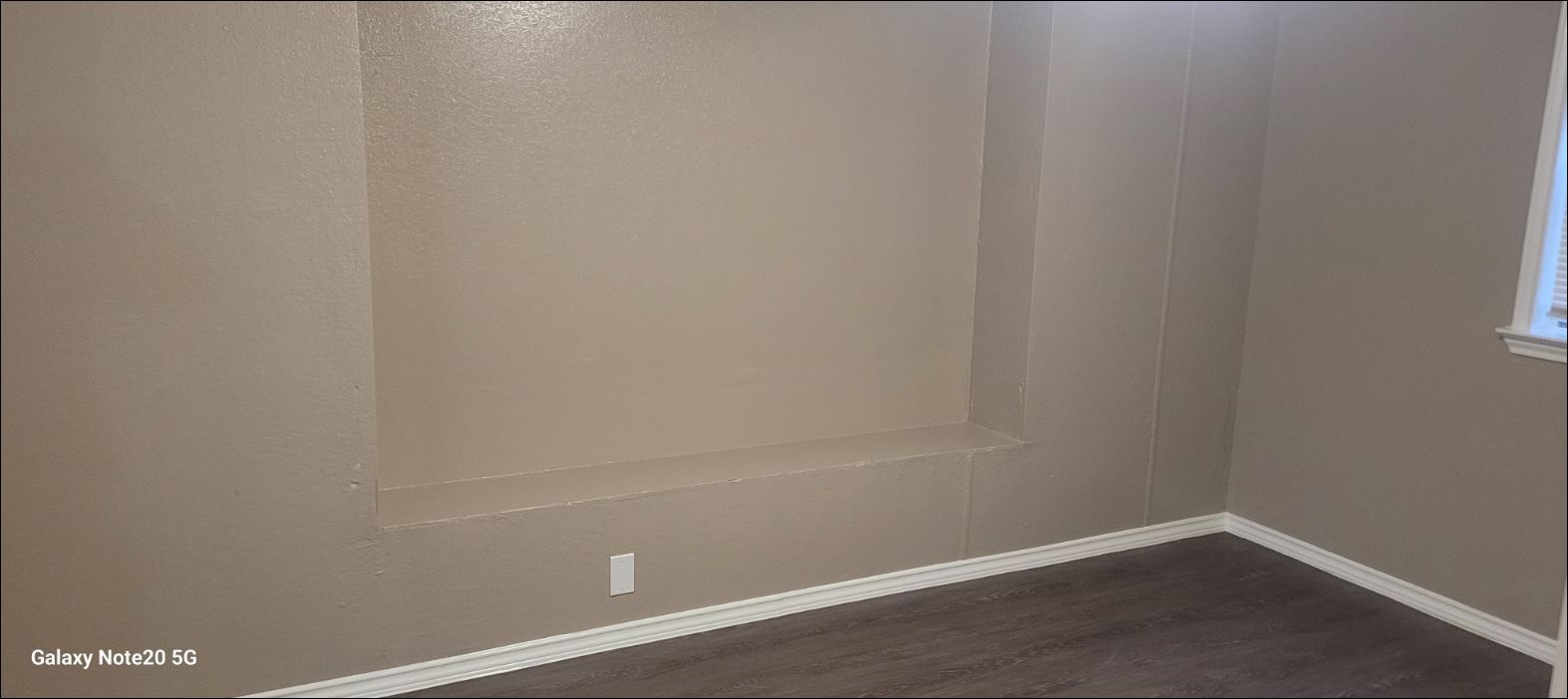 349 State Highway 95 Elgin, TX 78621 - Photo 2 of 16 Unfurnished room featuring dark wood-type flooring and baseboards