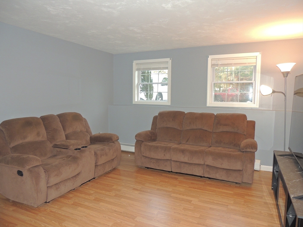 1 Gault Road, Unit 6 West Wareham, MA 02576 - Photo 3 of 9 a living room with furniture and a window