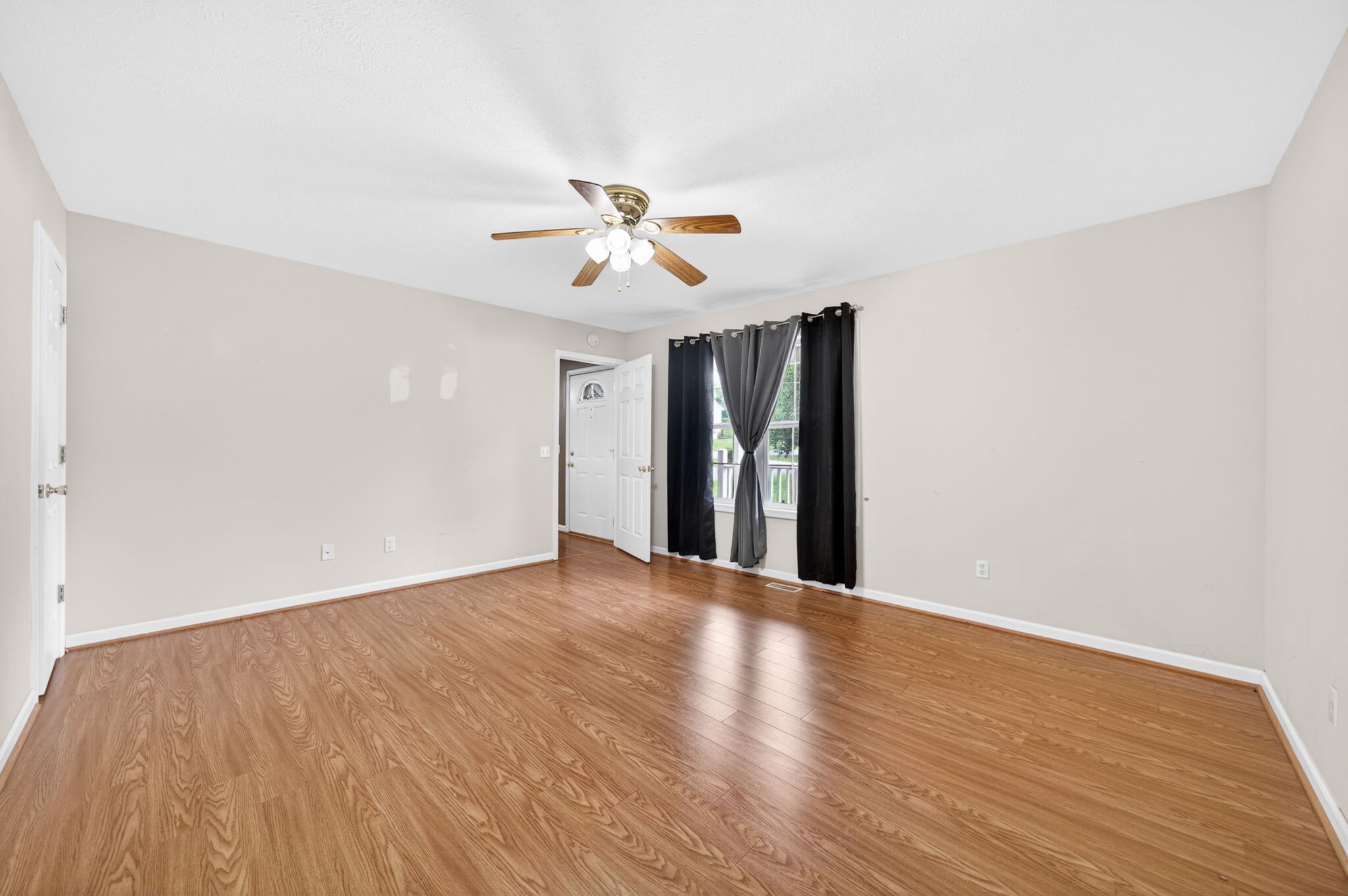 291 Poplar Point Lane Rickman, TN 38580 - Photo 17 of 41 a view of an empty room with wooden floor