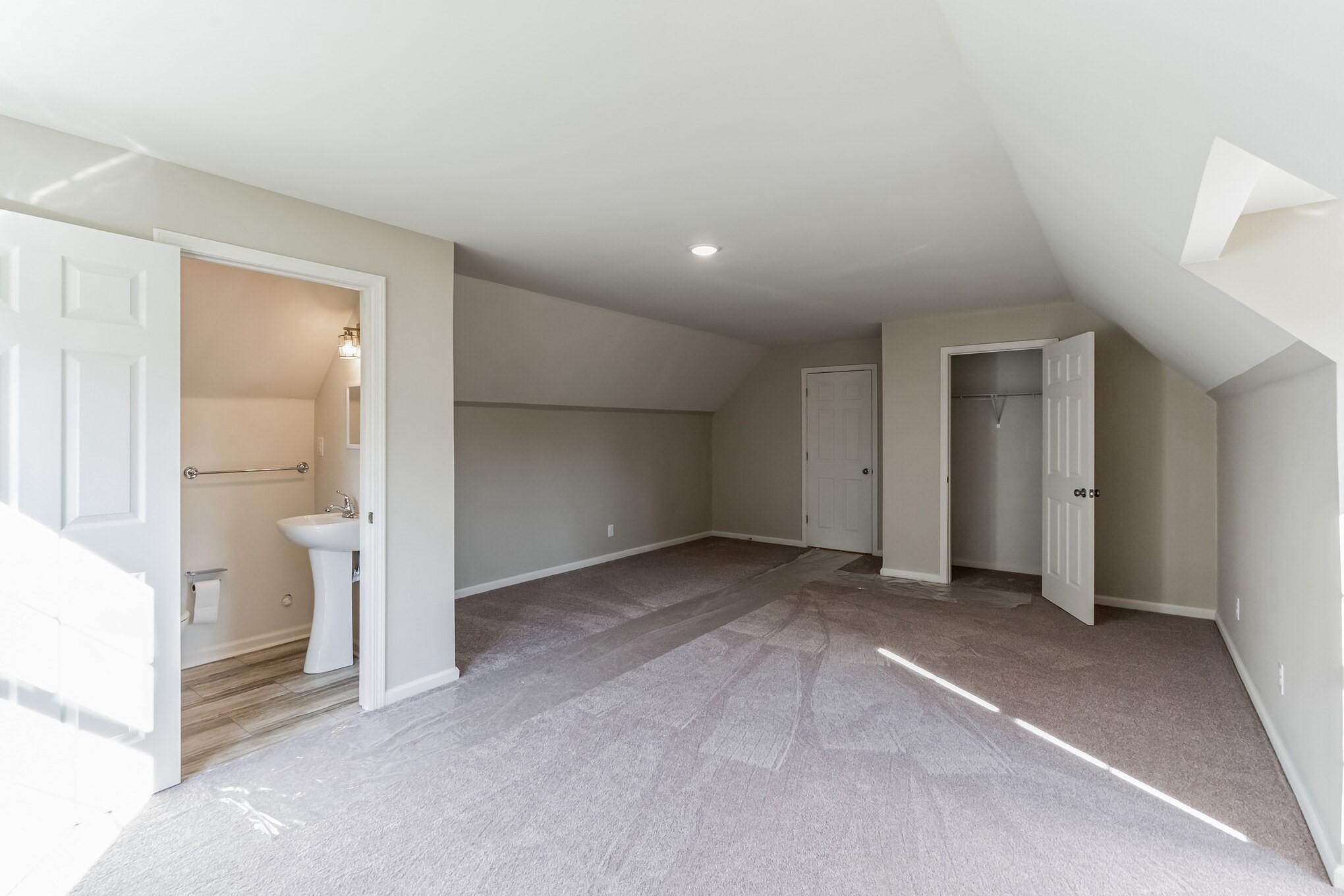 444 Culler Road Pinnacle, NC 27043 - Photo 23 of 34 an empty room with a cabinet and mirrors