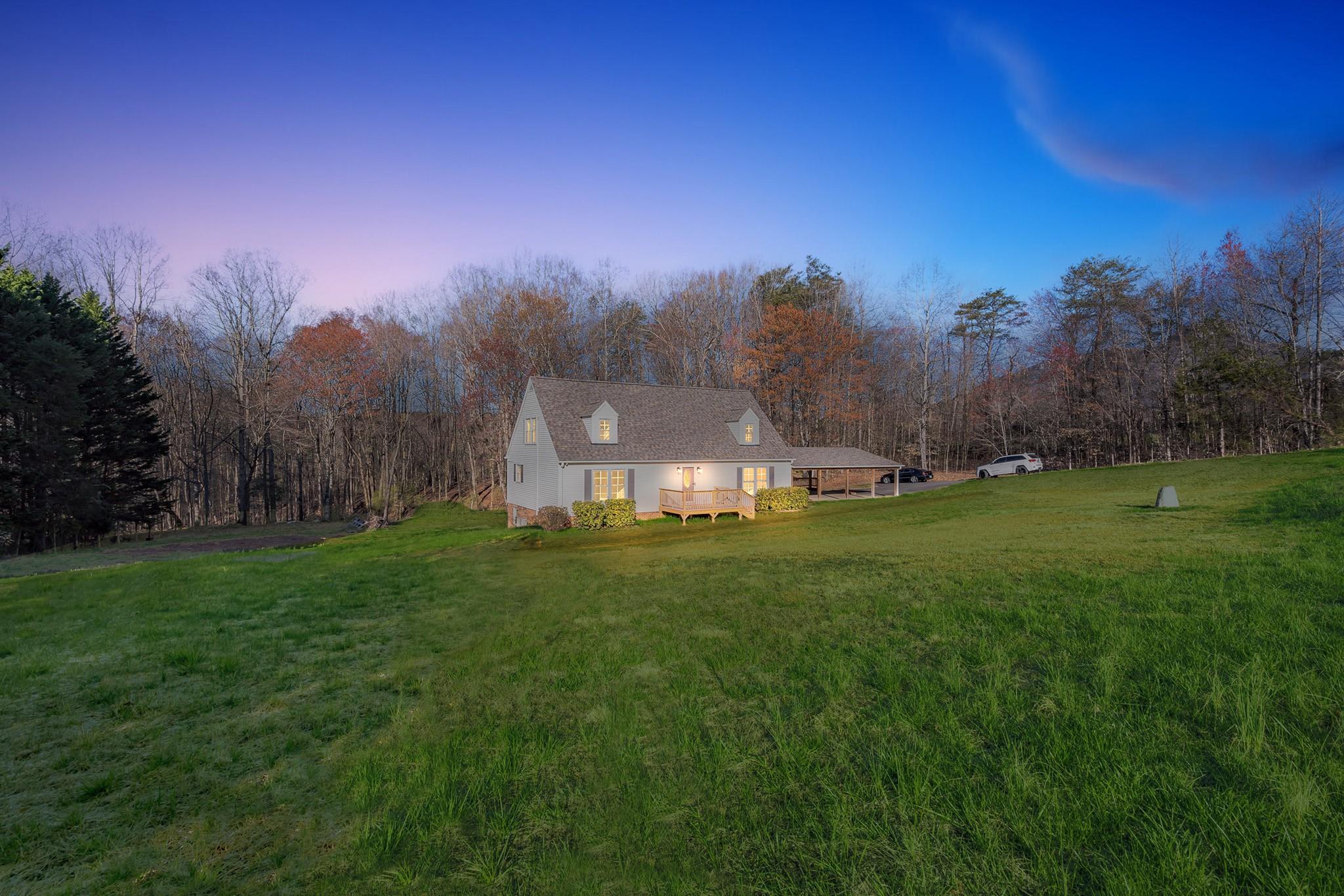 444 Culler Road Pinnacle, NC 27043 - Photo 28 of 34 a view of a big yard with a house in the background