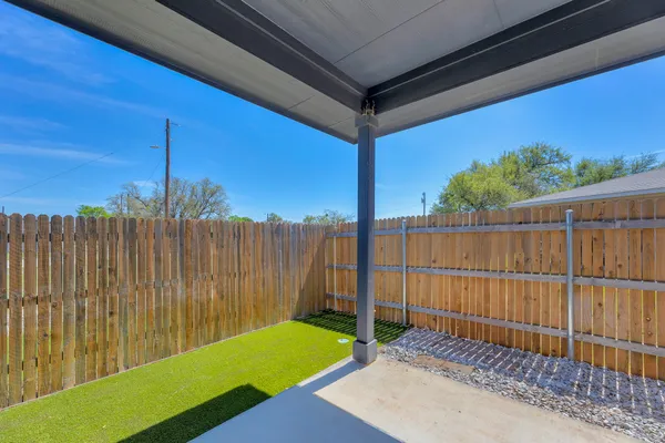 a house view with a backyard space