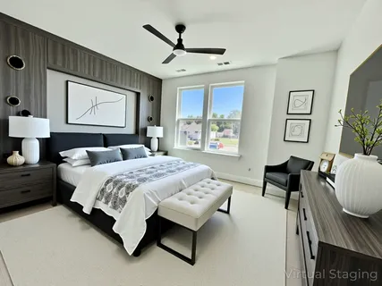a bedroom with furniture and a couch