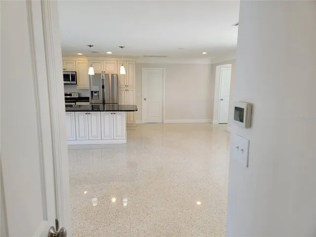 a view of a kitchen with a sink