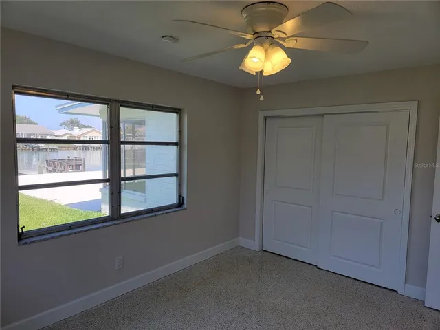 an empty room that has a window