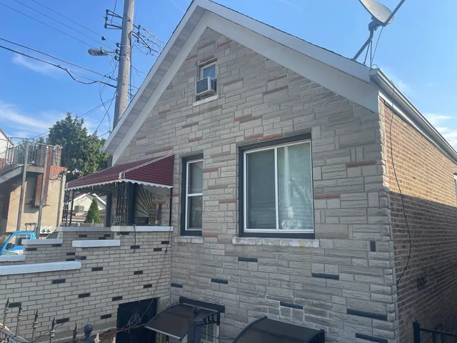 a view of house with two windows