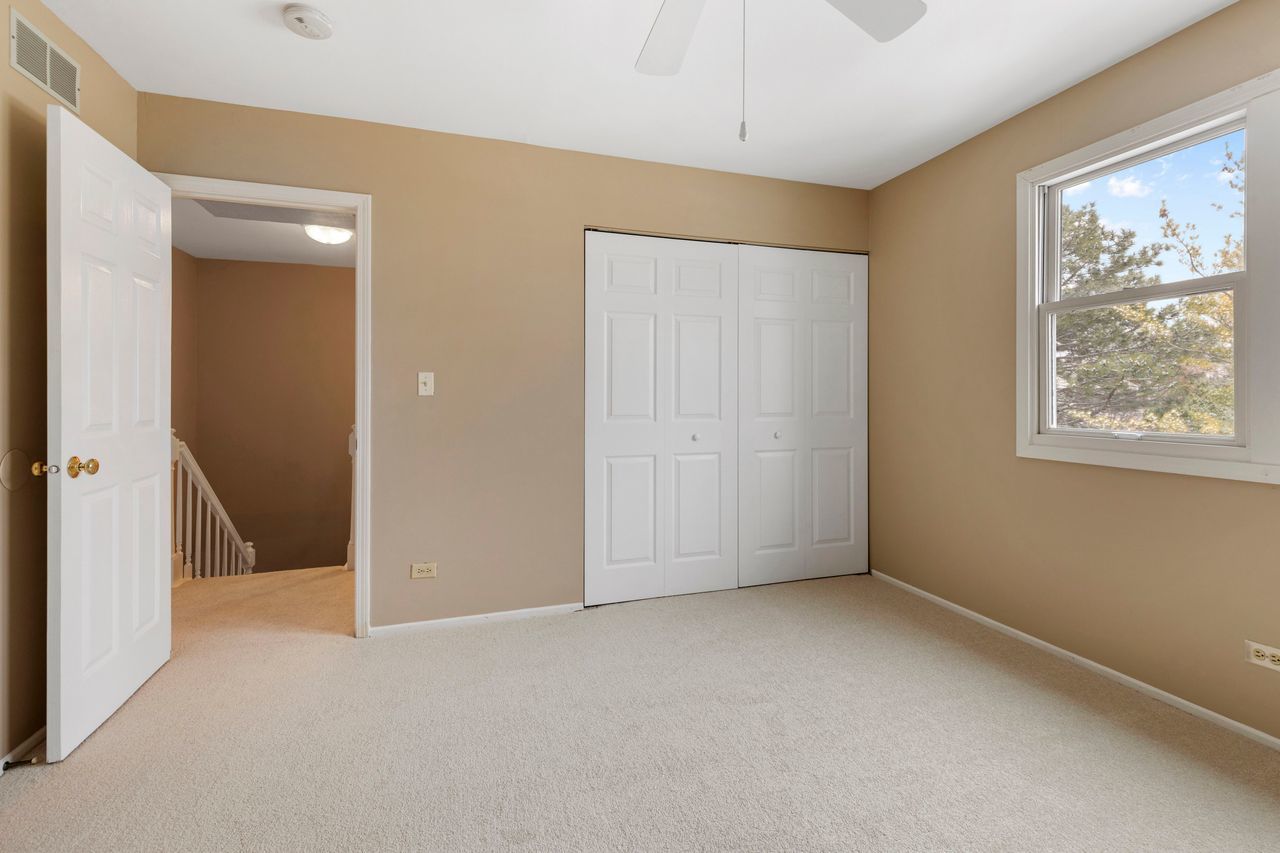 681 Randi Lane Hoffman Estates, IL 60169 - Photo 17 of 33 a view of an empty room with a window