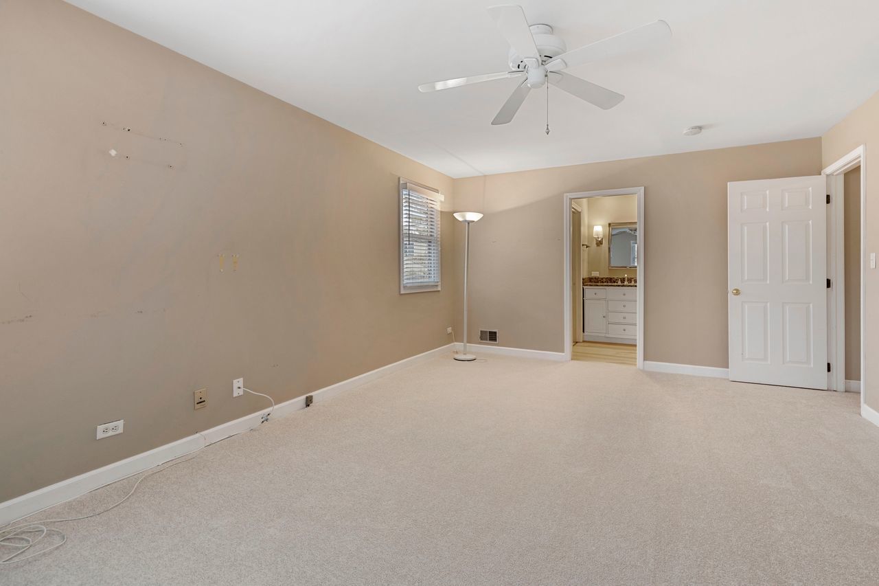 681 Randi Lane Hoffman Estates, IL 60169 - Photo 24 of 33 a view of an empty room with a window
