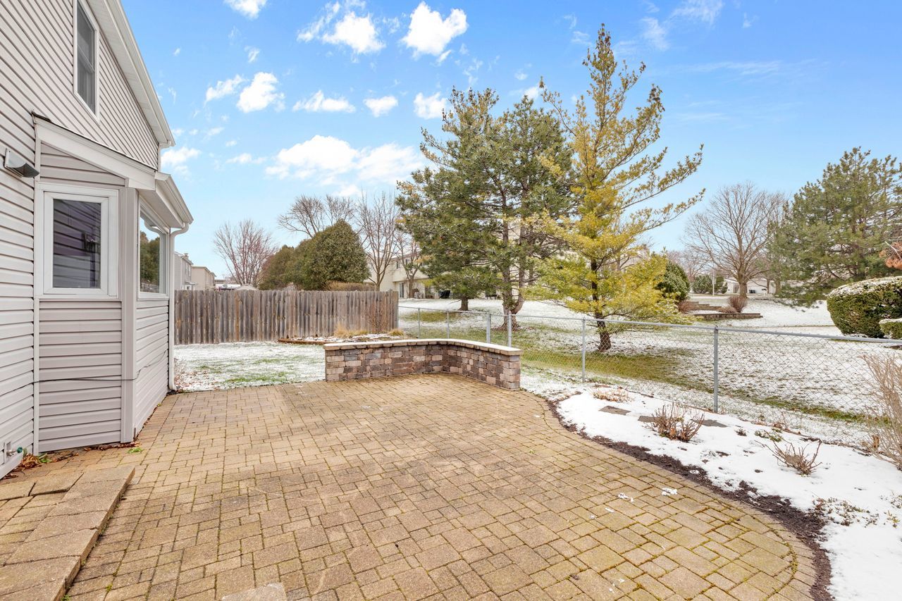 681 Randi Lane Hoffman Estates, IL 60169 - Photo 32 of 33 a view of a yard with snow on the road