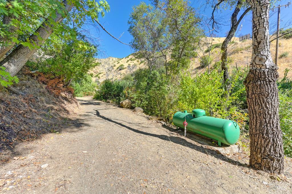 2985 Mix Canyon Road Vacaville, CA 95688 - Photo 14 of 34 a view of backyard with outdoor seating and green space
