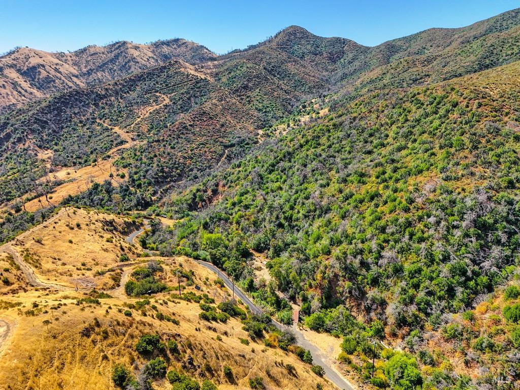 2985 Mix Canyon Road Vacaville, CA 95688 - Photo 34 of 34 a view of a large building with a mountain in the background