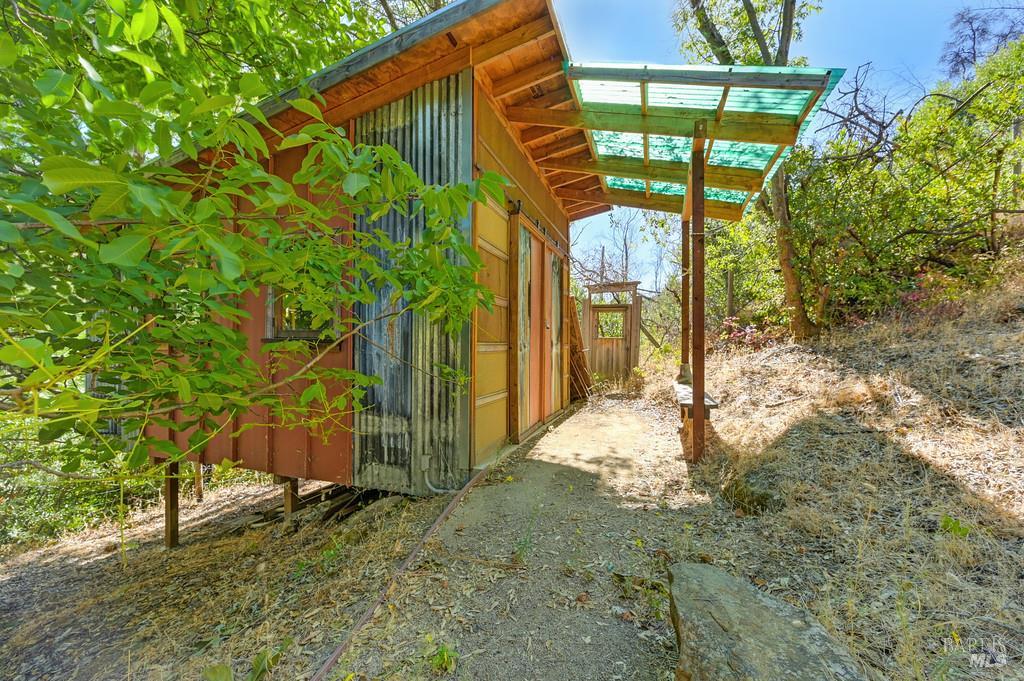2985 Mix Canyon Road Vacaville, CA 95688 - Photo 7 of 34 a backyard of a house with a tree