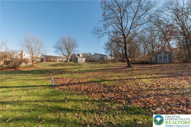 a view of a house with a big yard