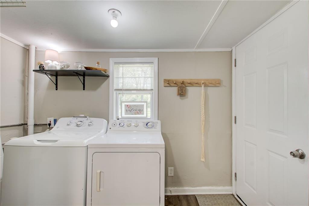 411 Ash Street Monroe, GA 30655 - Photo 9 of 36 a utility room with dryer and washer