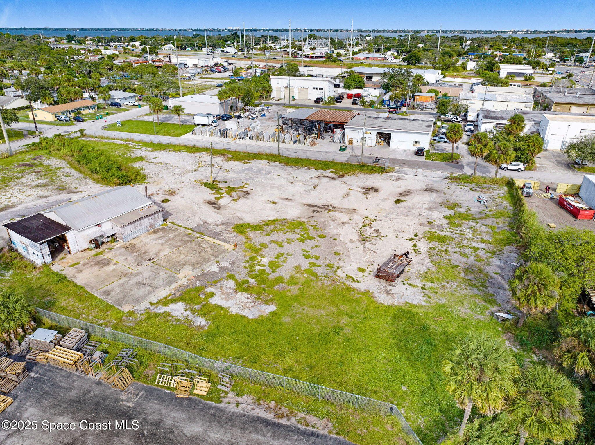 1075 Mcclendon Street Melbourne, FL 32935 - Photo 11 of 24 a view of swimming pool and lake view