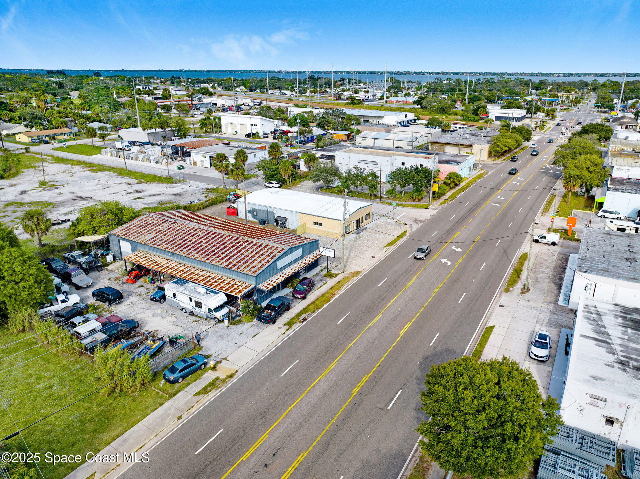 1075 Mcclendon Street Melbourne, FL 32935 - Photo 20 of 24 an aerial view of a city
