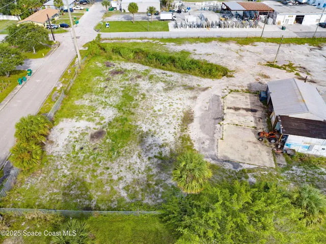 a view of swimming pool with a yard and seating area