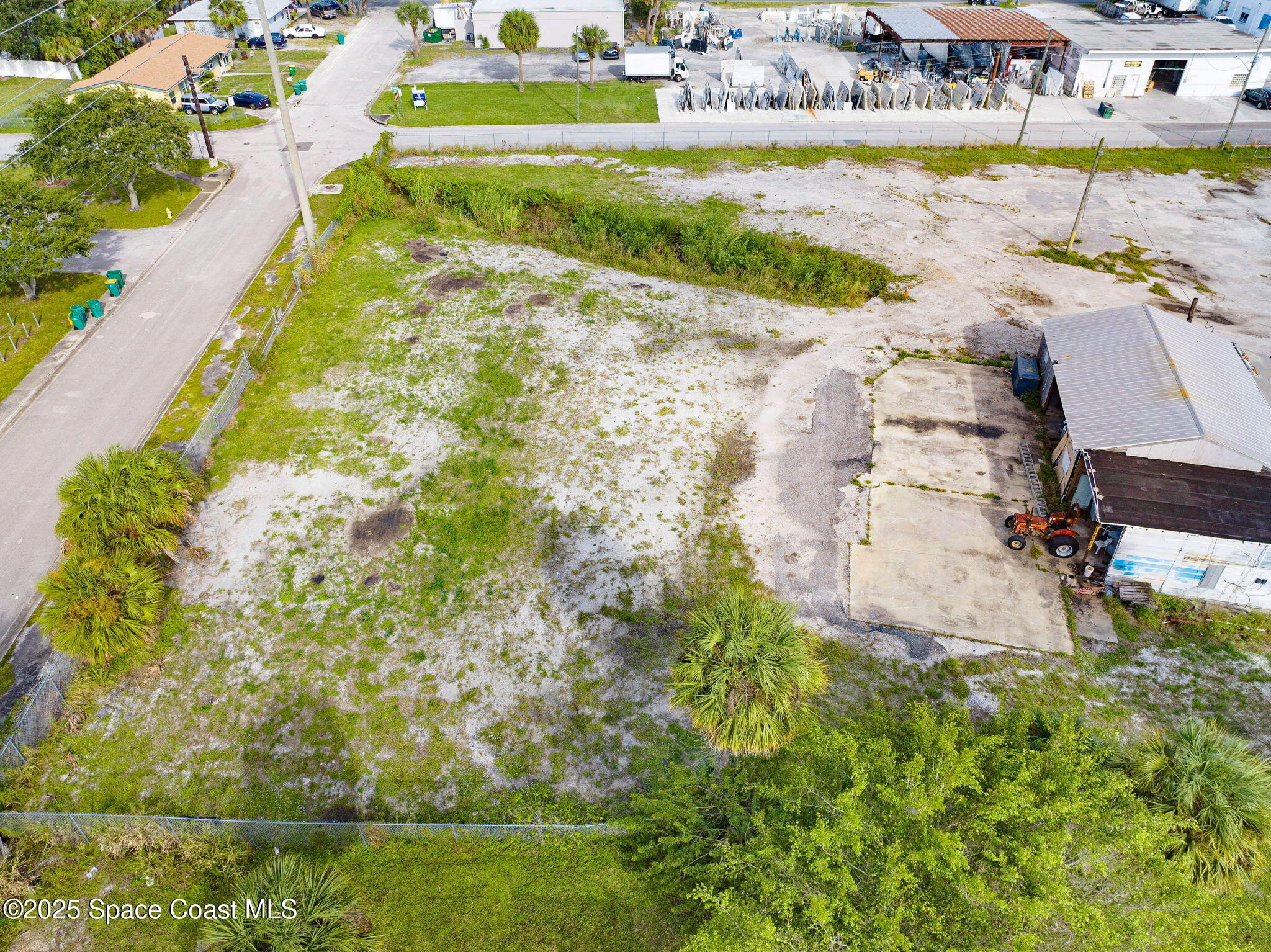 1075 Mcclendon Street Melbourne, FL 32935 - Photo 5 of 24 a view of a yard with an outdoor space