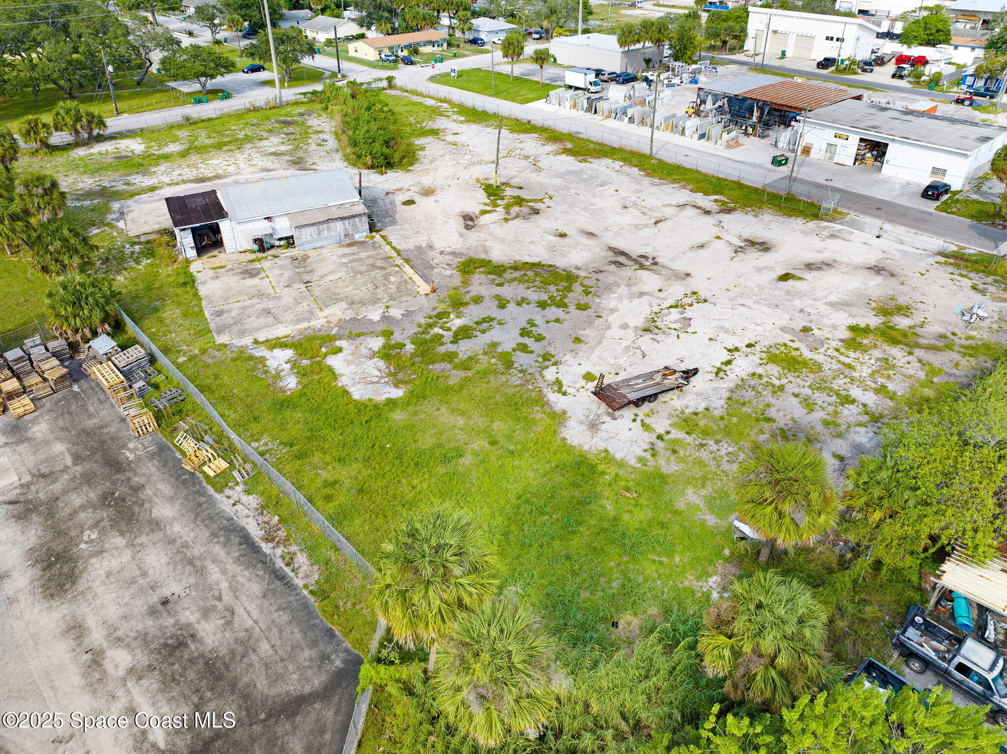 1075 Mcclendon Street Melbourne, FL 32935 - Photo 7 of 24 a view of yard with ocean view