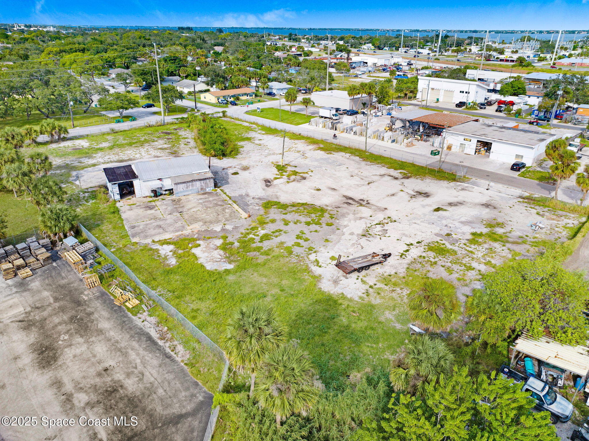 1075 Mcclendon Street Melbourne, FL 32935 - Photo 9 of 23 a view of a city with an ocean beach