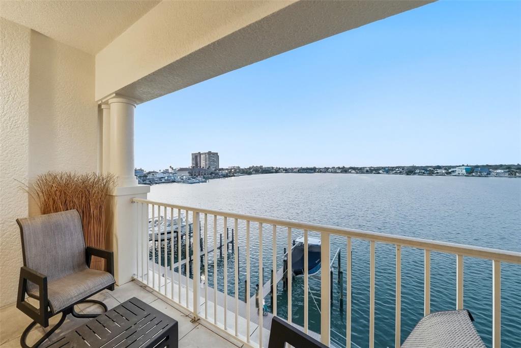 17735 Gulf Boulevard, Unit 405 Redington Shores, FL 33708 - Photo 1 of 1 a view of a chair and table in the balcony