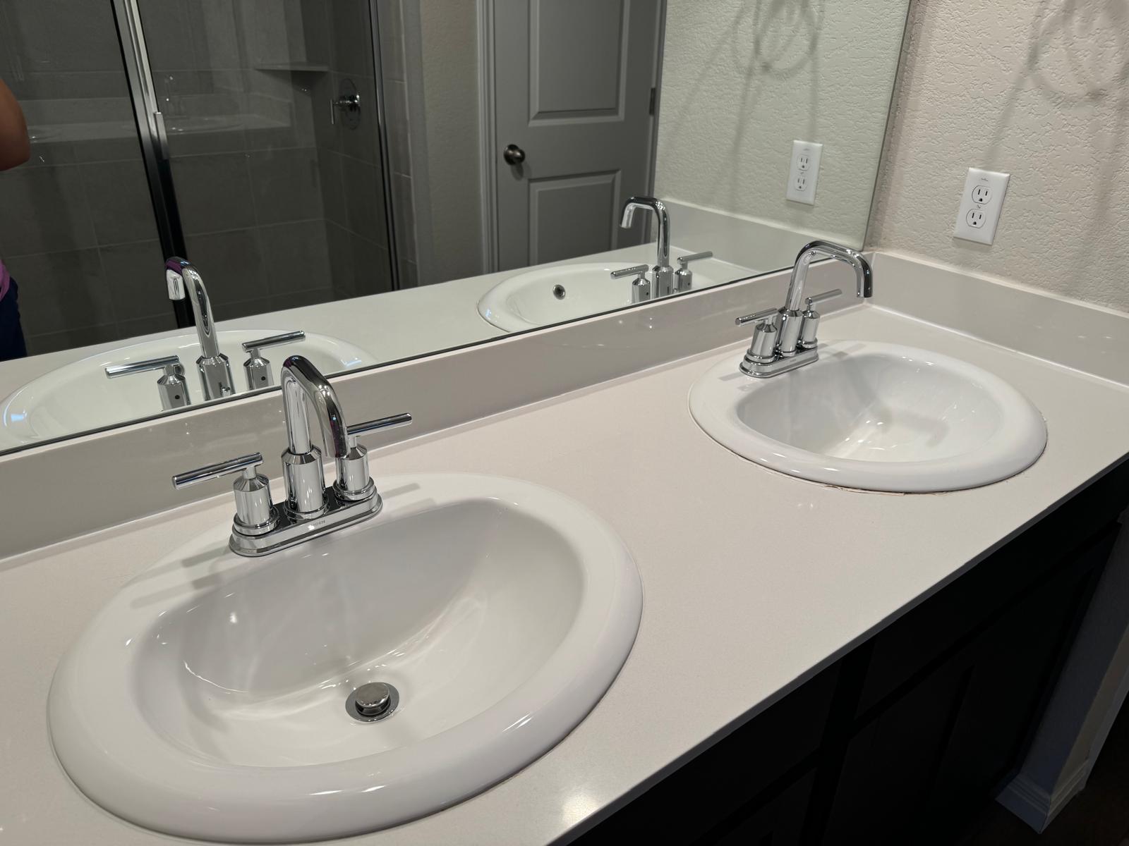 623 Sungrove Trail Georgetown, TX 78628 - Photo 12 of 17 Full bathroom featuring double vanity and a shower stall