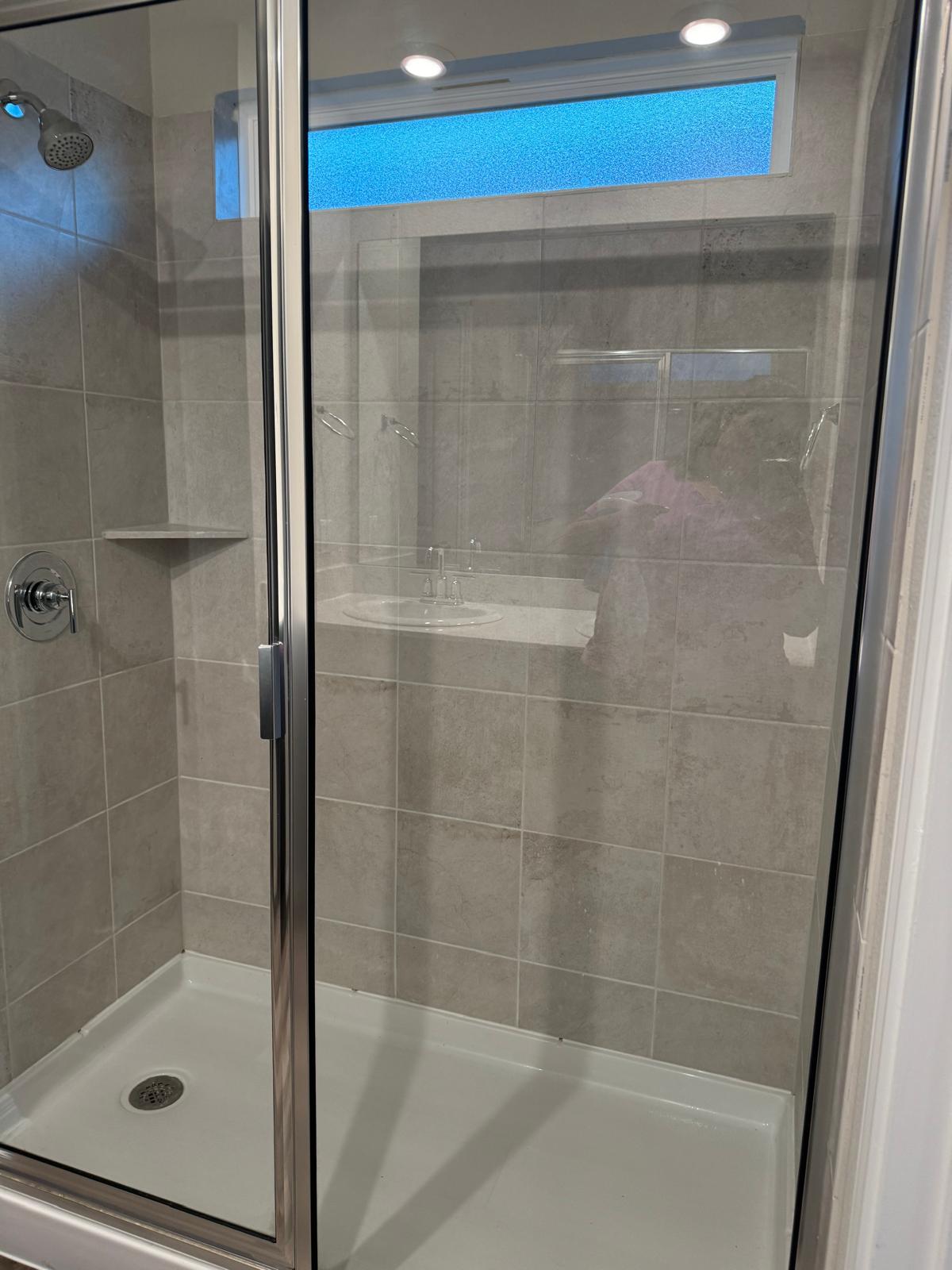 623 Sungrove Trail Georgetown, TX 78628 - Photo 13 of 17 Bathroom featuring a shower stall