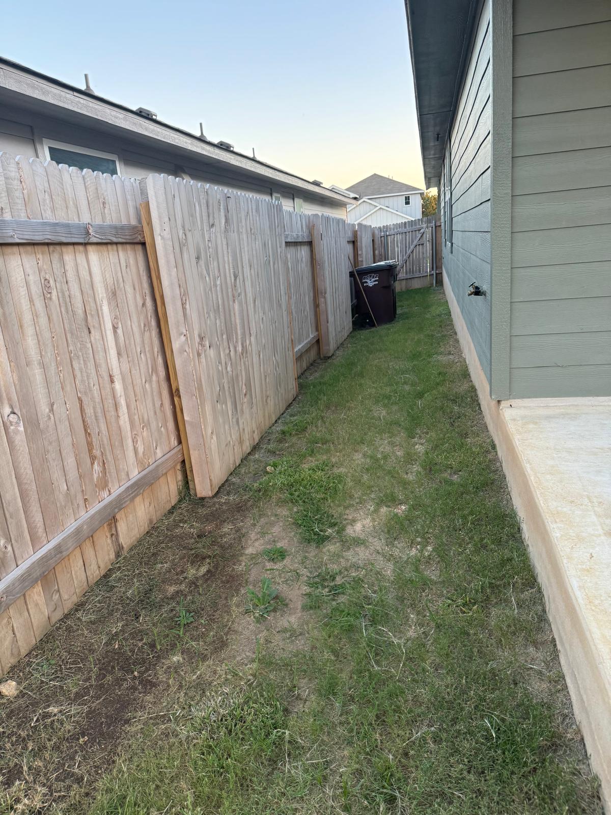 623 Sungrove Trail Georgetown, TX 78628 - Photo 16 of 17 Fenced backyard with a gate