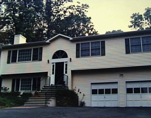 123 Hurd Road Trumbull, CT 06611 - Photo 1 of 1 a front view of a house with balcony
