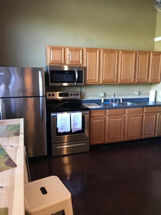 1106 Broadway, Unit 1106A Columbus, GA 31901 - Photo 11 of 13 kitchen from living area