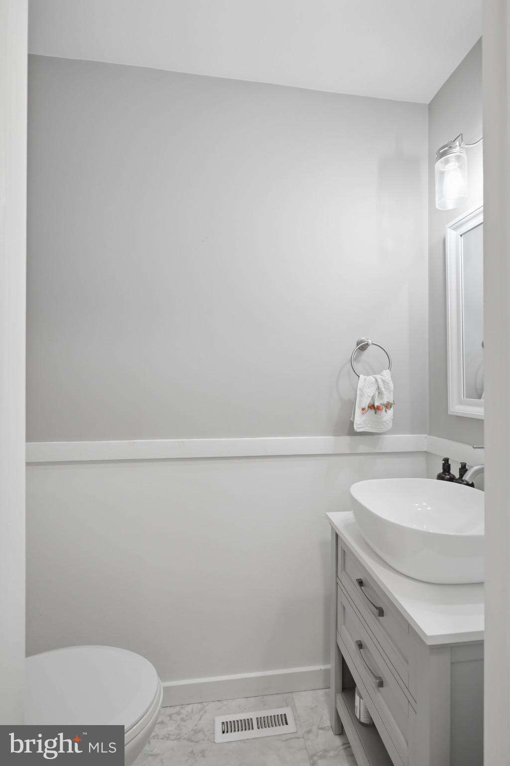 230 Cambridge Lane Lititz, PA 17543 - Photo 23 of 59 First floor half bath with chair railing