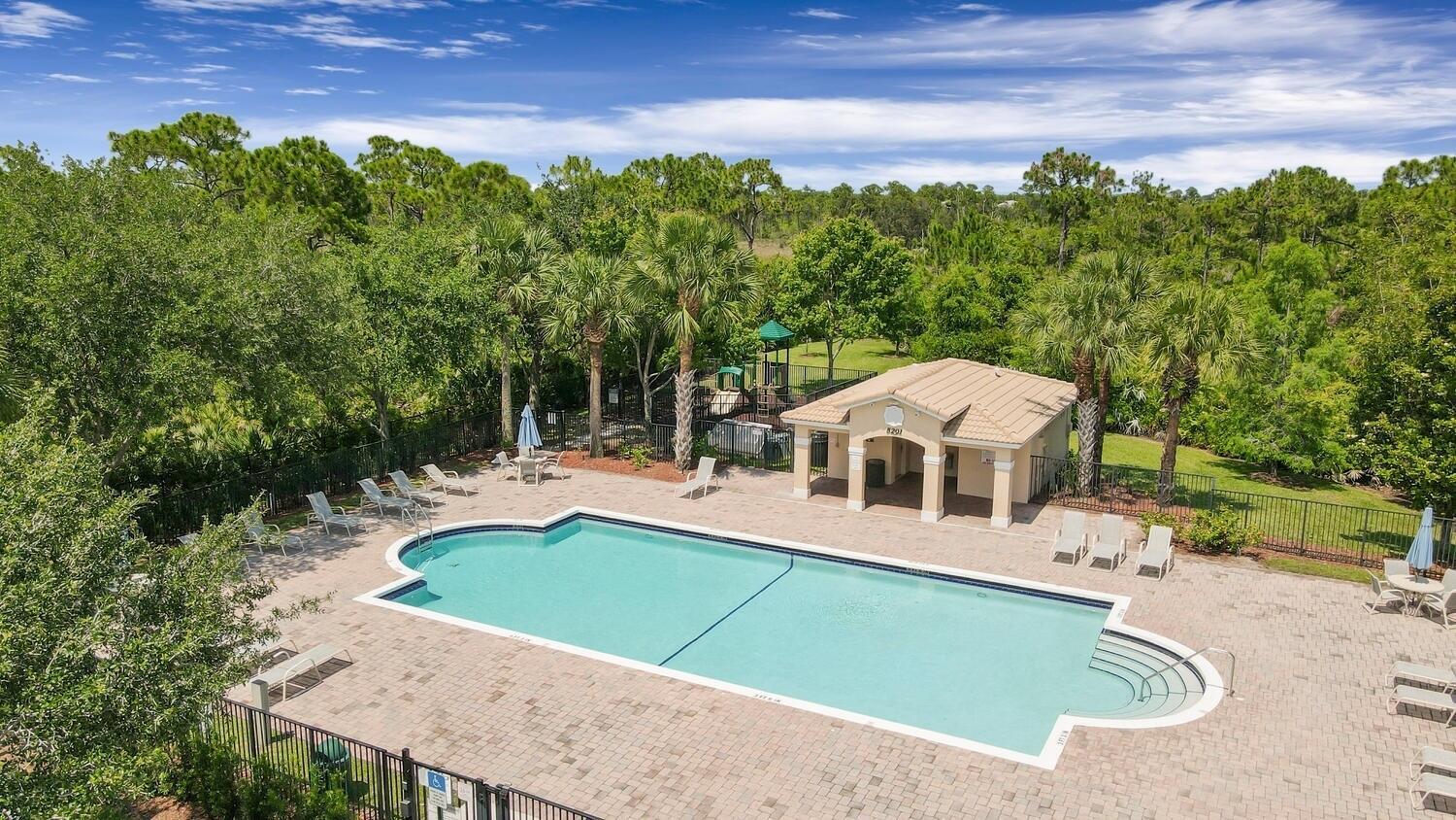 5410 Southeast Mitchell Lane Stuart, FL 34997 - Photo 23 of 24 swimming pool view with a seating space