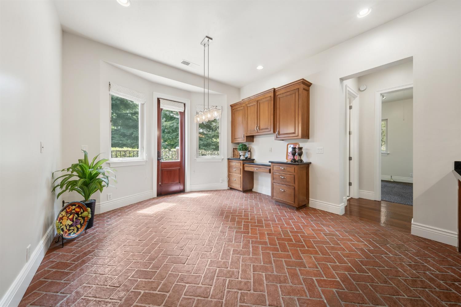 9738 Rim Rock Circle Loomis, CA 95650 - Photo 28 of 97 Informal Dining area off kitchen. Heated simulated brick flooring. Very comfortable to walk on yet beautifully appealing.