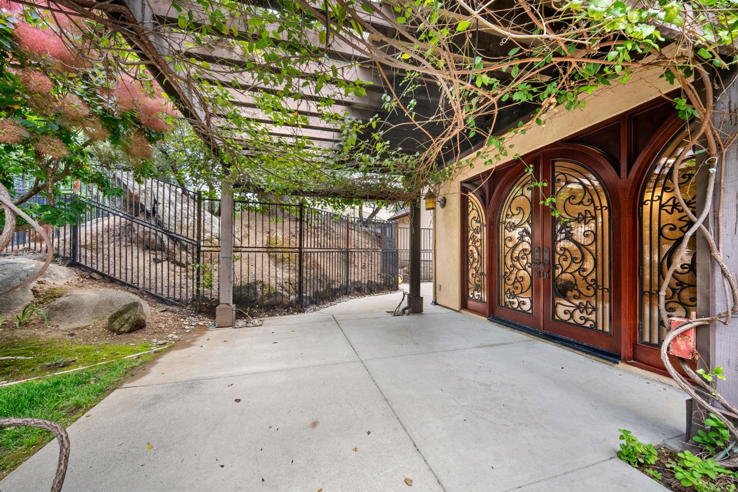 9738 Rim Rock Circle Loomis, CA 95650 - Photo 46 of 97 Veranda off Primary suite with beautiful vine covered patio.