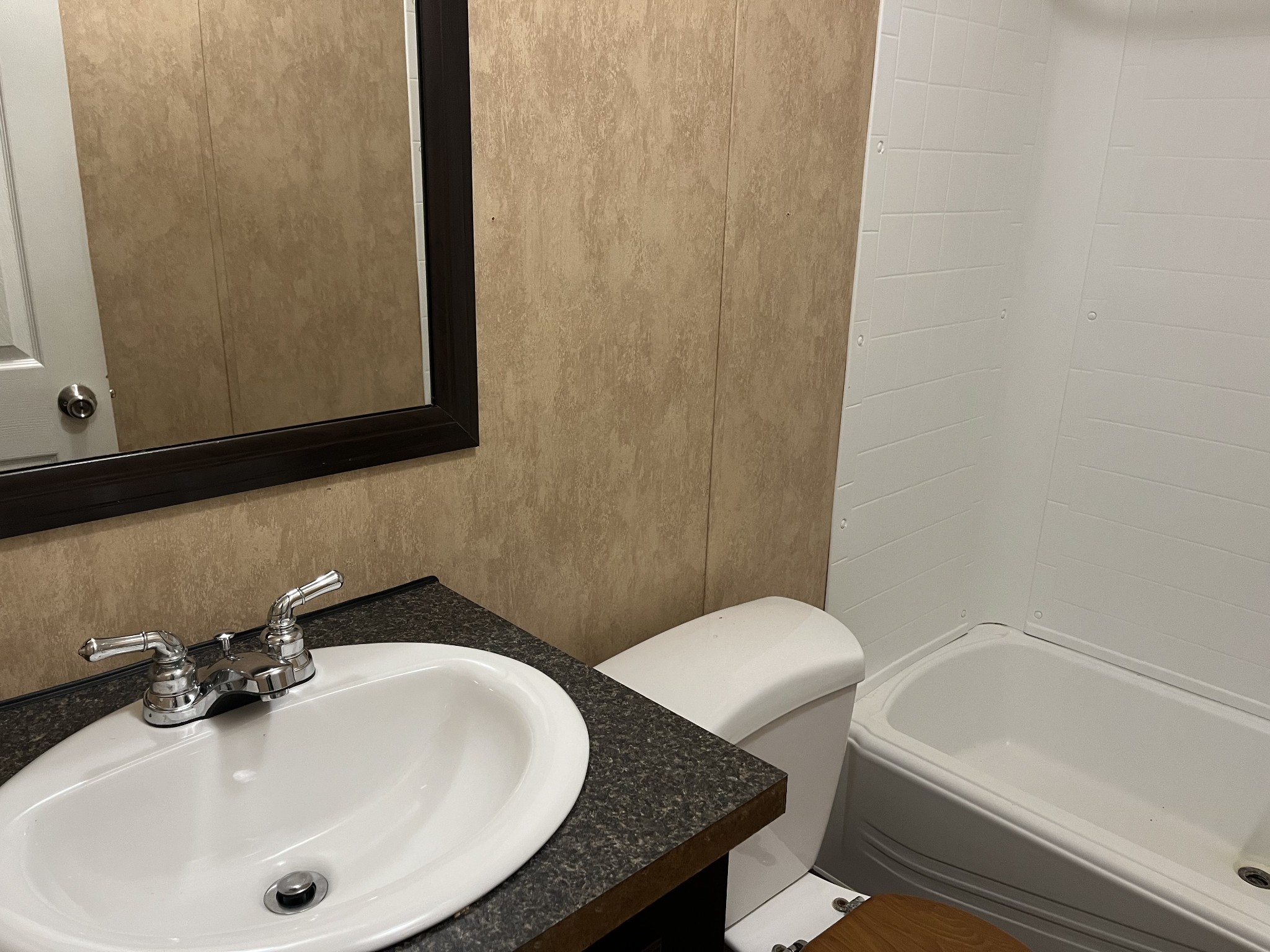 954 Normandy Road Normandy, TN 37360 - Photo 20 of 26 a bathroom with a sink and a mirror