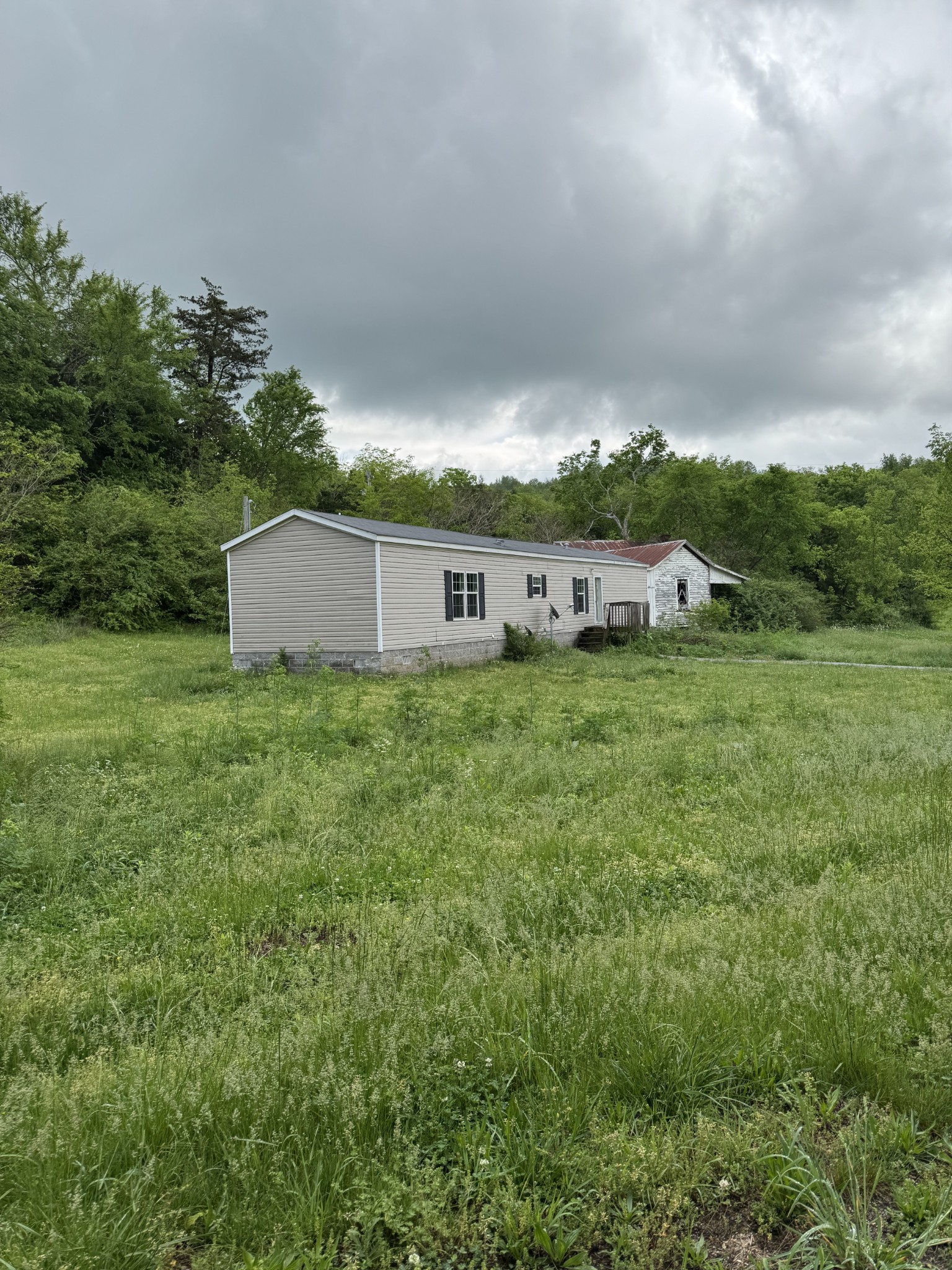 954 Normandy Road Normandy, TN 37360 - Photo 6 of 26 a view of a house with a yard